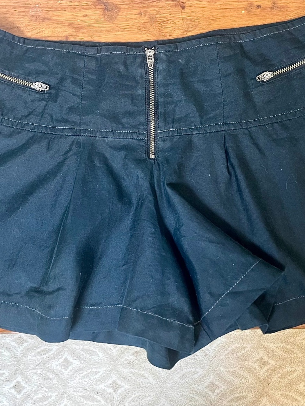 Vintage late-2000s/Y2K-era Free People flowy shorts in black silk blend, size 4.